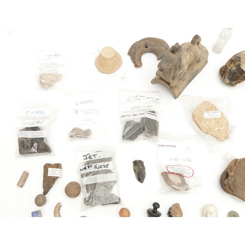 444 - A collection of East Yorkshire archaeological finds, to include a Roman bronze mask 5.5cm, bronze ag... 