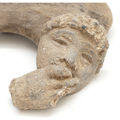 444 - A collection of East Yorkshire archaeological finds, to include a Roman bronze mask 5.5cm, bronze ag... 