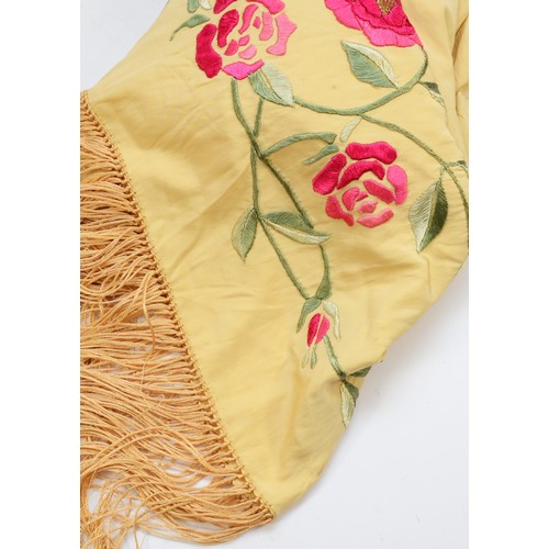 451 - An early nineteenth century Chinese silk wrap, with pink embroidered florals and a fringe trim, 108c... 