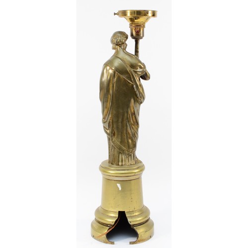 457 - A late 19th century gilt bronze newel post lamp, in the form of a classical lady, electric light fit... 