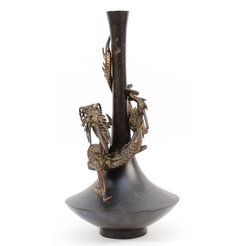 483 - A Japanese Meiji period bronze Genryusai Seiya style dragon vase, apparently unsigned, 25.5cm.
Lacki... 