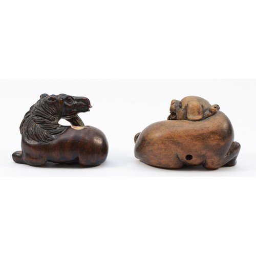 493 - A Japanese Meiji period netsuke of a recumbent horse, black glass eyes, inset signature, 4.5cm and a... 