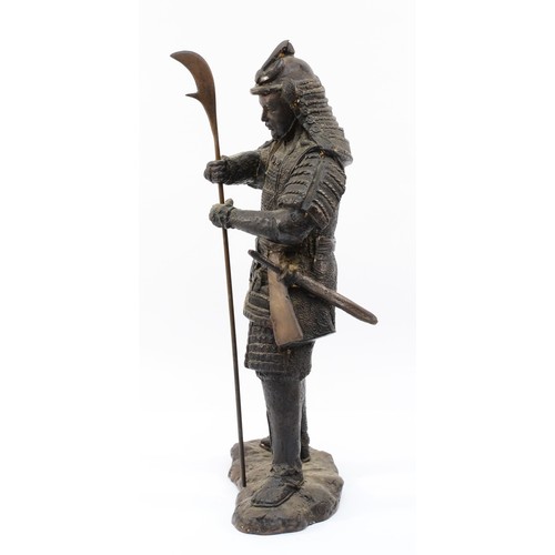 495 - A Japanese bronze of a Samurai warrior, holding an axe spear, apparently unsigned, 46cm