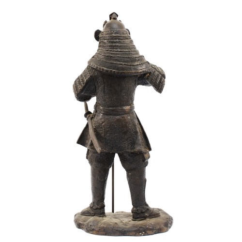 495 - A Japanese bronze of a Samurai warrior, holding an axe spear, apparently unsigned, 46cm