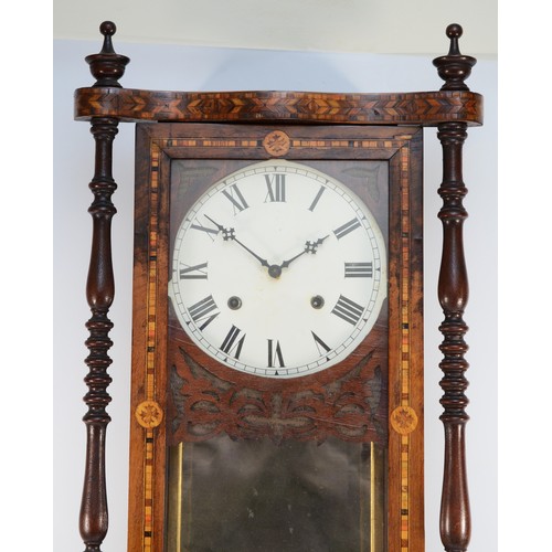 502 - An American 19th century ornate rosewood and inlaid wall clock, mirrored interior, pendulum, 96cm