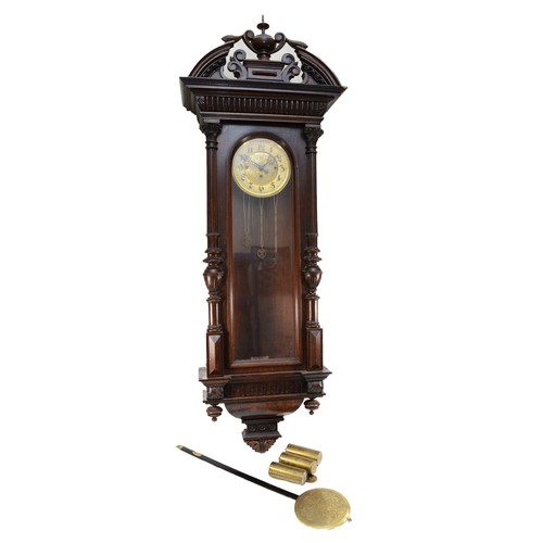 503 - Gustav Becker, a 19th century stained walnut three weight Vienna wall clock, the brass dial with flo... 