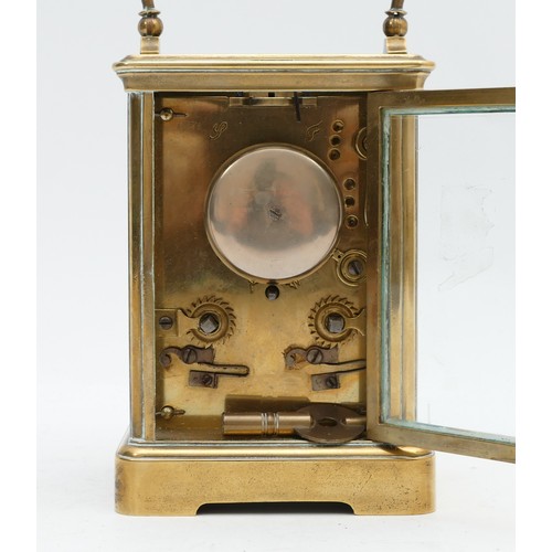 511 - J.A. Aubert Fils, Lausanne, a 19th century brass striking carriage clock, the white enamel dial sign... 