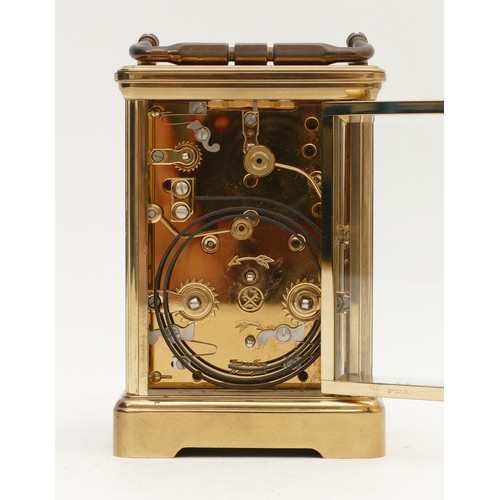 512 - L'Epee, an early 20th century brass alarm/striking/repeating carriage clock, the white enamel dial s... 