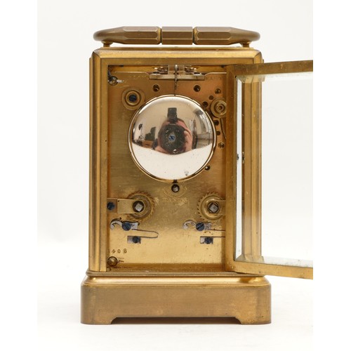 514 - A late 19th century brass repeating and striking carriage clock, white enamel dial with Roman numera... 