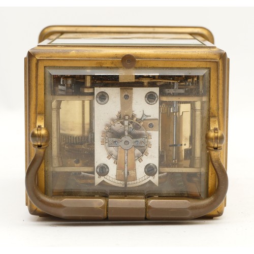 514 - A late 19th century brass repeating and striking carriage clock, white enamel dial with Roman numera... 