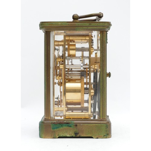 516 - Matthew Norman, London, an early 20th century brass alarm and striking carriage clock, the white ena... 