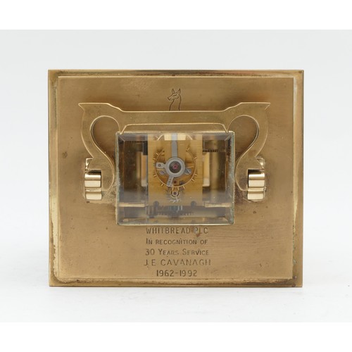 519 - Bravingtons, Renown, a 20th century large brass prestation carriage time piece, the case numbered E7... 