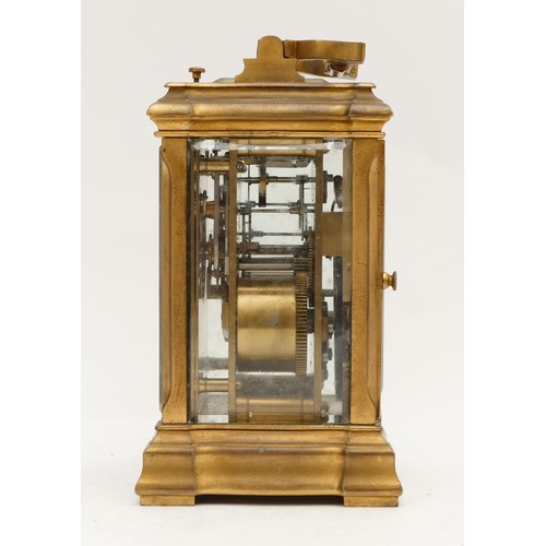 521 - A late 19th century French brass carriage striking and repeating clock, the white enamel  dial signe... 