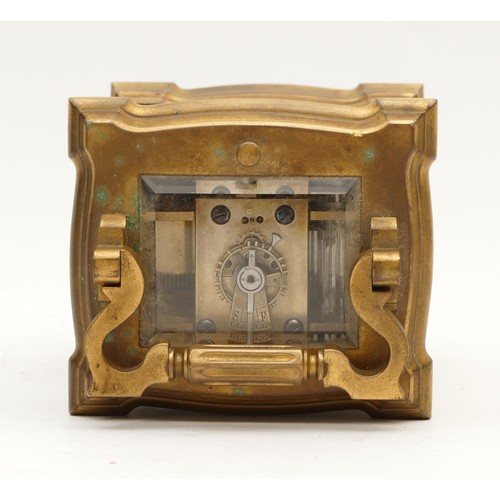 521 - A late 19th century French brass carriage striking and repeating clock, the white enamel  dial signe... 