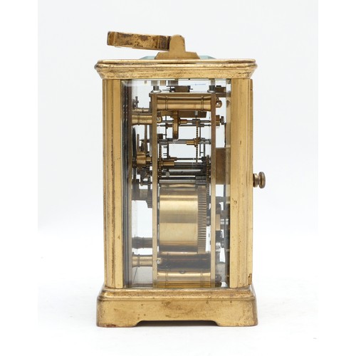 528 - An early 20th century brass striking carriage clock, white enamel dial with Roman numerals, the move... 