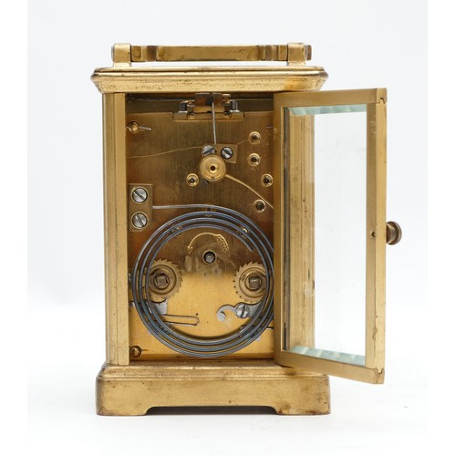 528 - An early 20th century brass striking carriage clock, white enamel dial with Roman numerals, the move... 