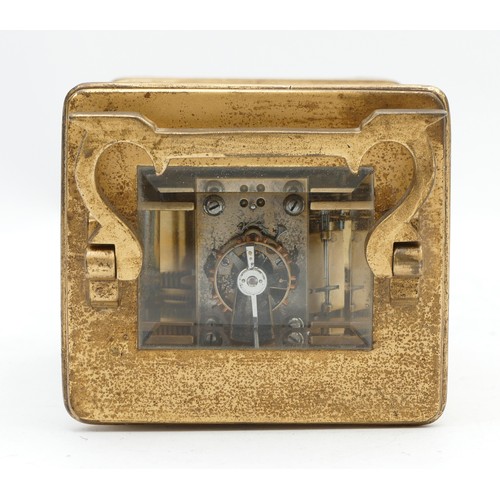 528 - An early 20th century brass striking carriage clock, white enamel dial with Roman numerals, the move... 