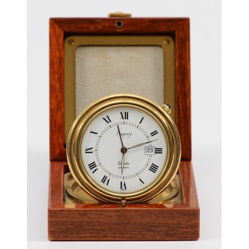 531 - Asprey, a gilt brass circular travel alarm clock with date aperture, synthetic sapphire crown, hours... 