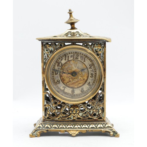 533 - The British United Clock Co., Ltd., a late 19th pierced cast brass desk clock, with cherub dial, 14.... 