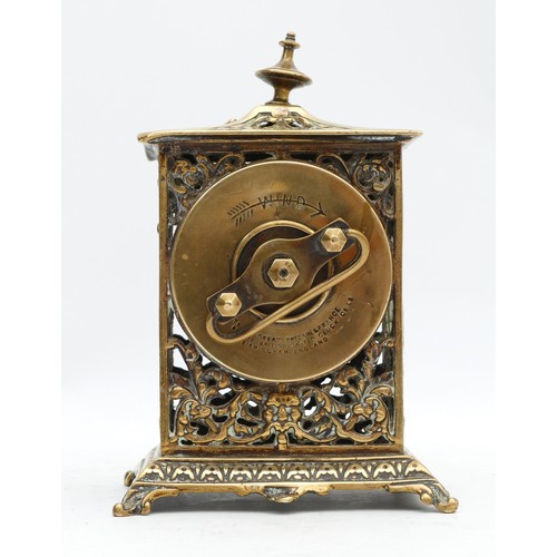 533 - The British United Clock Co., Ltd., a late 19th pierced cast brass desk clock, with cherub dial, 14.... 