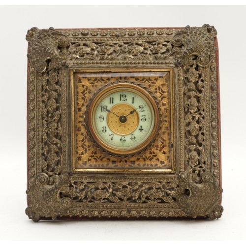 534 - The British United Clock Co., Ltd., a late 19th pierced cast brass desk clock, with easel back, 16 x... 