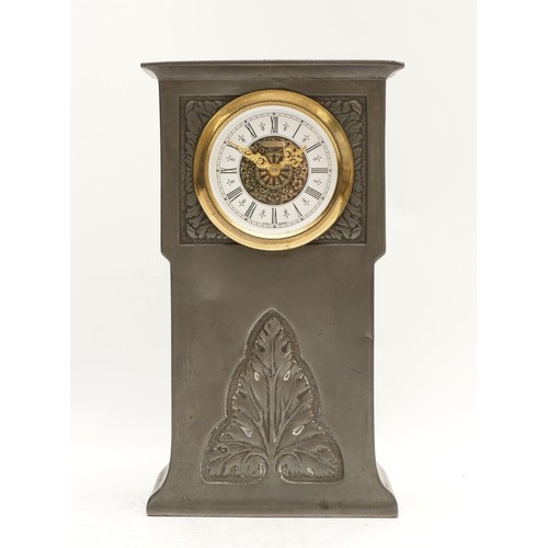 536 - Liberty & Co., a Tudric pewter mantel time piece, the case cast with stylized leaf design, replaceme... 