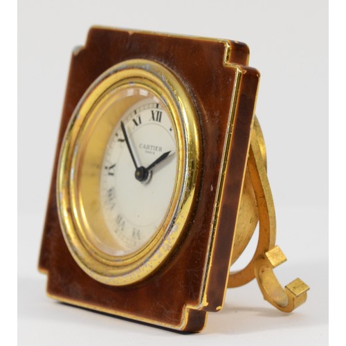 539 - Cartier, a gold plated and brown lacquer manual wind alarm clock, model 7512, serial number 03003, s... 