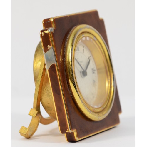 539 - Cartier, a gold plated and brown lacquer manual wind alarm clock, model 7512, serial number 03003, s... 