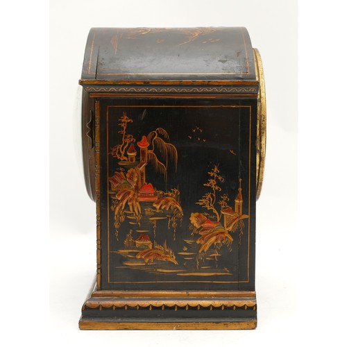 542 - A French Chinoiserie mantel clock, black field with raised figures and buildings, 20.5 x 16cm.
Not w... 