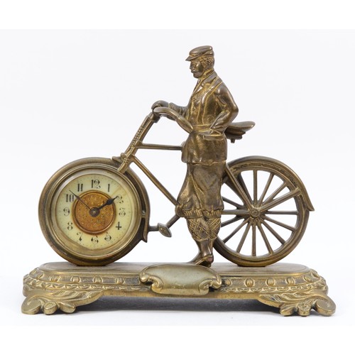 544 - The British United Clock Co., Ltd., an early 20th cast novelty brass desk clock, c.1910, in the form... 