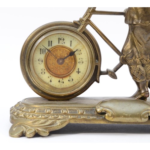 544 - The British United Clock Co., Ltd., an early 20th cast novelty brass desk clock, c.1910, in the form... 