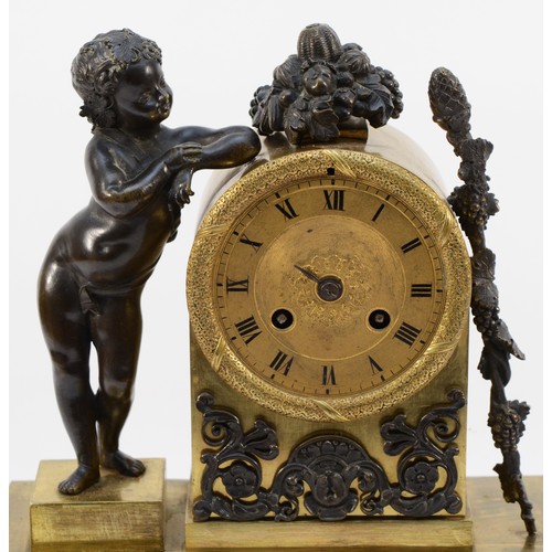 547 - A late 19th century bronze and gilt bronze figural mantel clock, with cherub to one side, pendulum, ... 