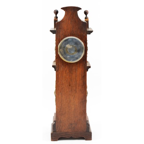 551 - W. Thornhill & Co., an Edwardian oak and brass miniature longcase clock, white enamel dial with Roma... 