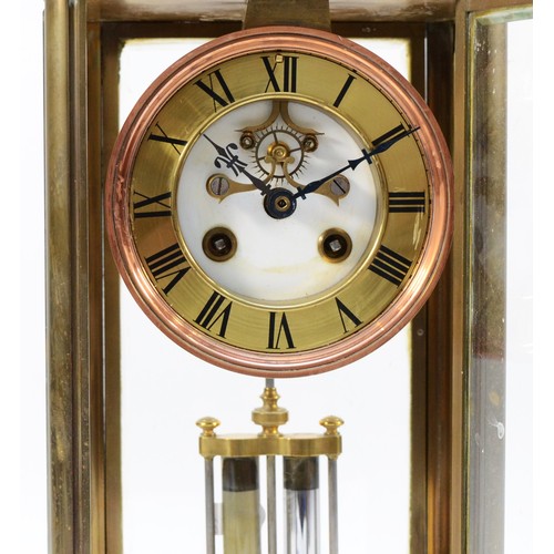 554 - Samuel Marti, an early 20th century French four glass brass mantel clock, visible escapement, the si... 