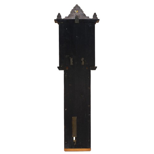 557 - A late 19th century Improved Admiral Fitzroy barometer in carved oak cased with printed circular sca... 