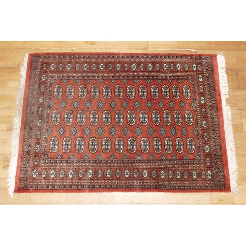 574 - A hand-knotted Teke Turkmen Bokhara Deluxe rug, with a fringe trim, the Teke design is inspired by e... 