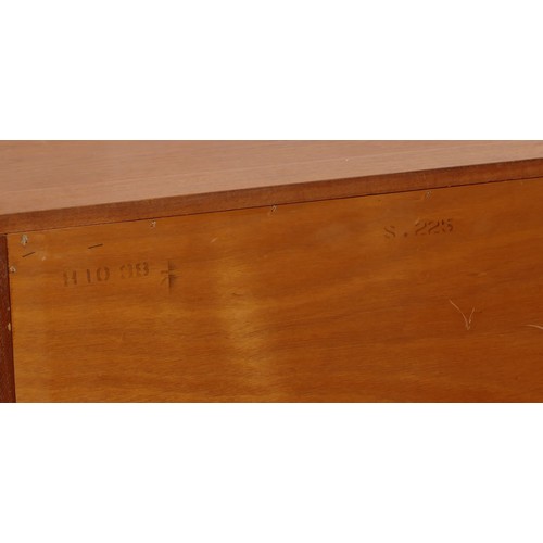 585 - A 1960s teak dressing/vanity table, the hinged top of rectangular form opening to mirrored interior,... 