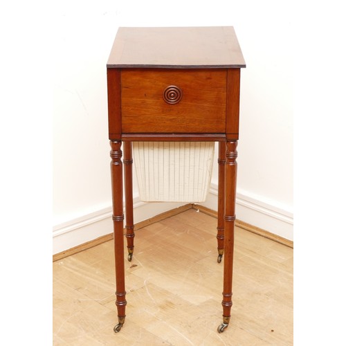 594 - A Victorian figured mahogany and crossbanded sewing table, the rectangular top with chamfered corner... 