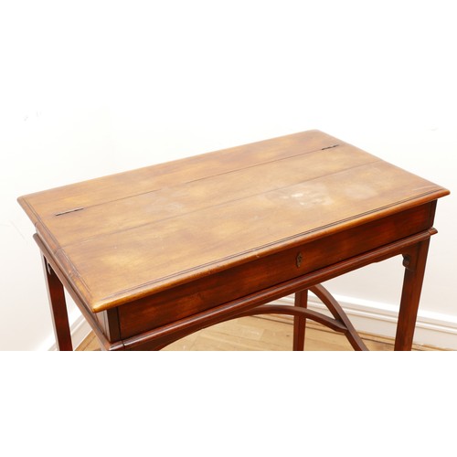 595 - A Victorian mahogany ladies writing desk, the hinged top of rectangular form opening to a slide out ... 