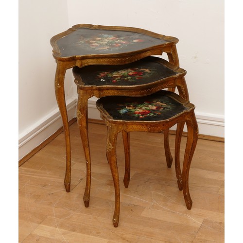 597 - A nest of three Italian giltwood nesting tables, circa 20th century, of heart shape form, the painte... 