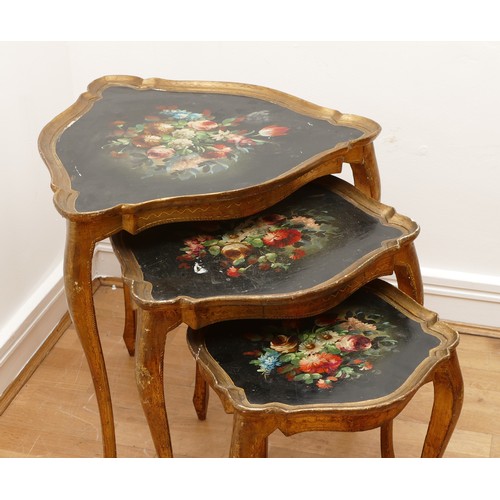 597 - A nest of three Italian giltwood nesting tables, circa 20th century, of heart shape form, the painte... 