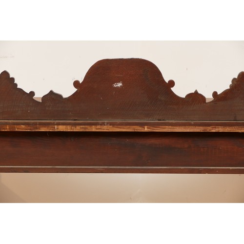 599 - An Edwardian carved oak entrance hall table, the rectangular top having galleried upstand carved fol... 