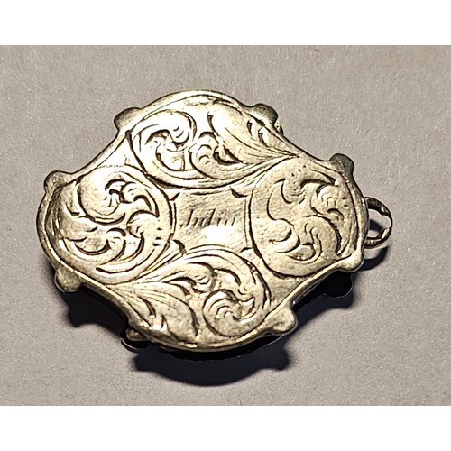 38 - A Victorian cartouche shaped vinaigrette, by Francis Clarke, Birmingham 1845, 2.5 x 2cm, 6gm