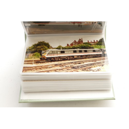 21 - 6 small albums containing approximately 500 postcard-sized colour photographs of diesel and electric... 