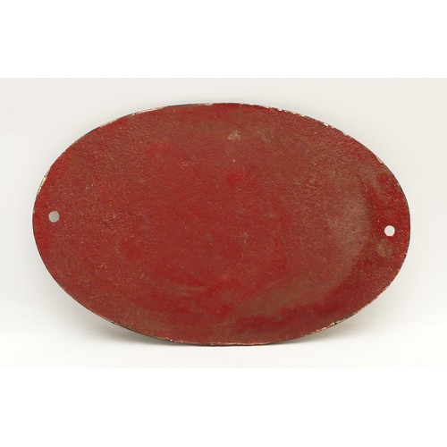 29 - An oval cast-iron bridge plate, L.M.S 107.