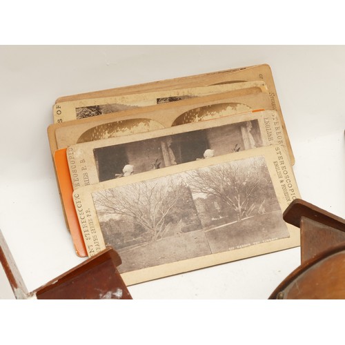 63 - An early twentieth century Sterescope, with another incomplete example and 39 stereocards, with exam... 