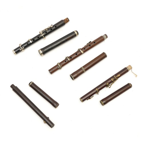 95 - Eight flutes, to include, examples with silver toned and brass banding. (8)