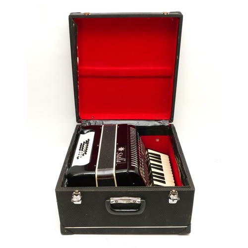 97 - A mid 20th century Stella accordion, in fitted case.