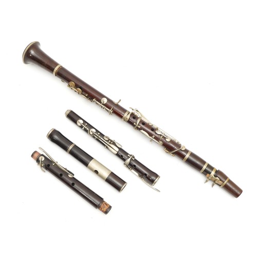 102 - A late 19th century Chappell & Co Ltd rosewood clarinet, having four section body, nickel plated mou... 