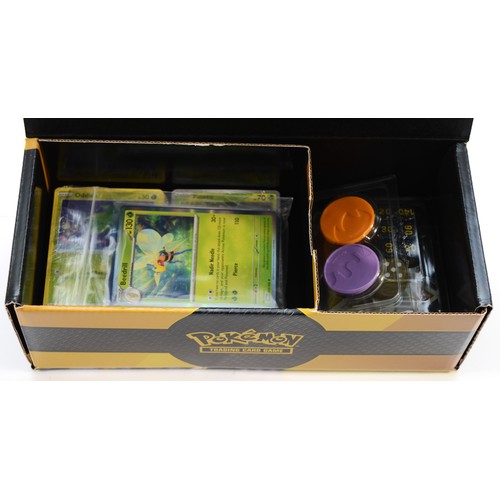 104 - Pokémon TCG Trainers Toolkit. Does not have the original cards and booster packs. Instead it has a b... 